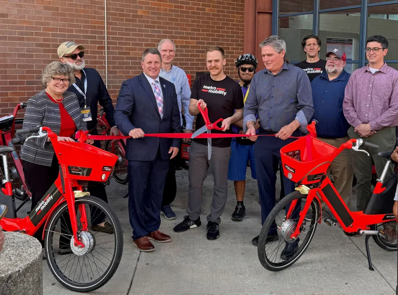 Ribbon-cutting for Metro Mobility's e-bike share program at the LRTA bus hub in Lowell